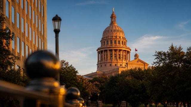 The Texas State Capitol dome in Austin at golden hour.